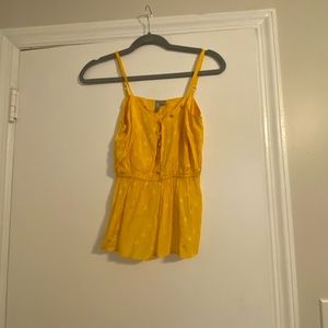 Yellow top with subtle heart polka dots